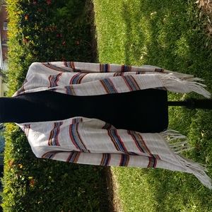 Boho style sweater with fringe bottom